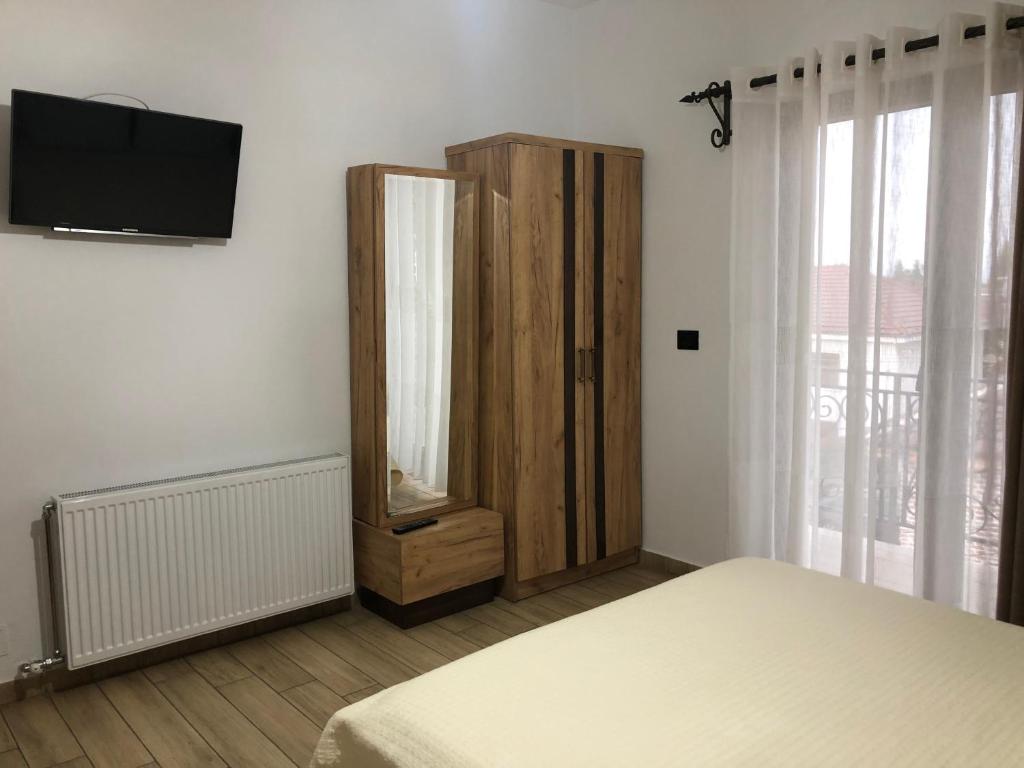 Postel nebo postele na pokoji v ubytování Vila Ilo