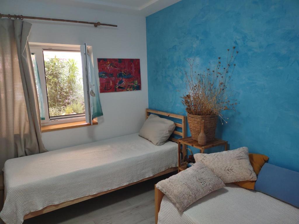 Posteľ alebo postele v izbe v ubytovaní Stone Villa Hvar Ana Nikola Beach Park and Sea View