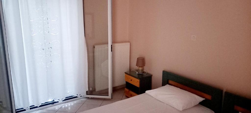 Postel nebo postele na pokoji v ubytování SPIROS HOME
