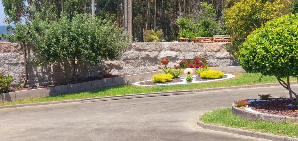 A garden outside A Casa de Carballo