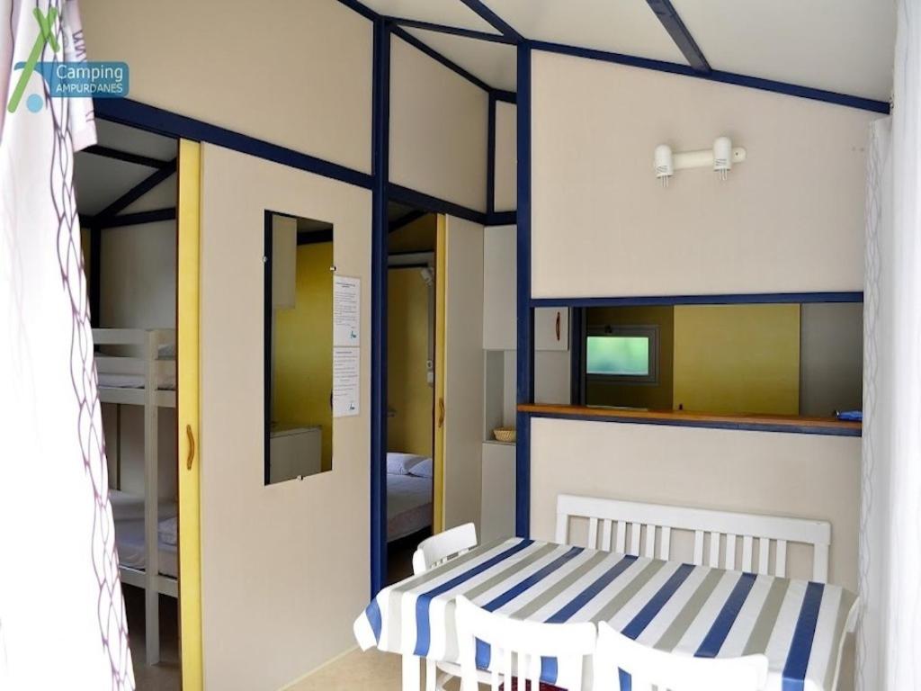 Posteľ alebo postele v izbe v ubytovaní Camping Ampurdanes
