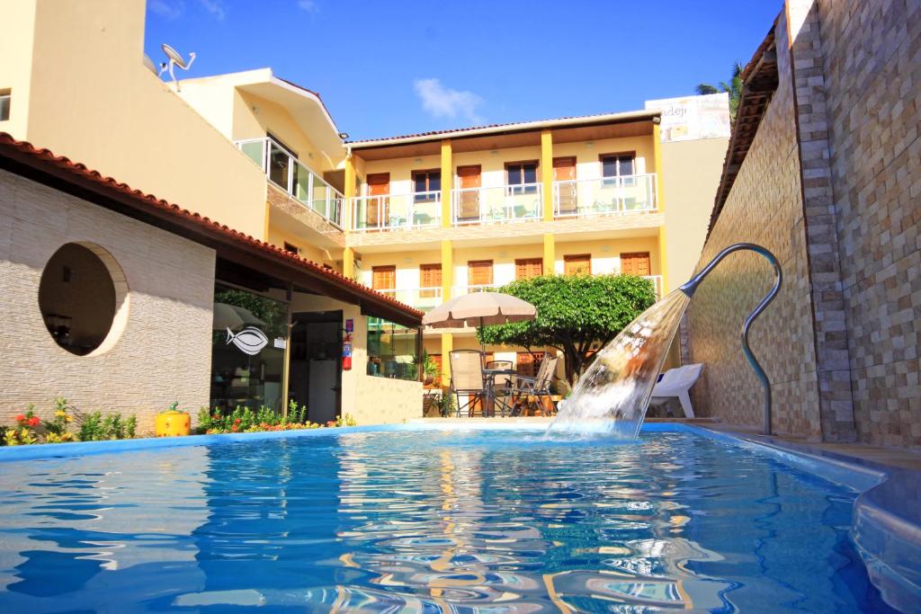 A piscina em ou perto de Pousada Badejo