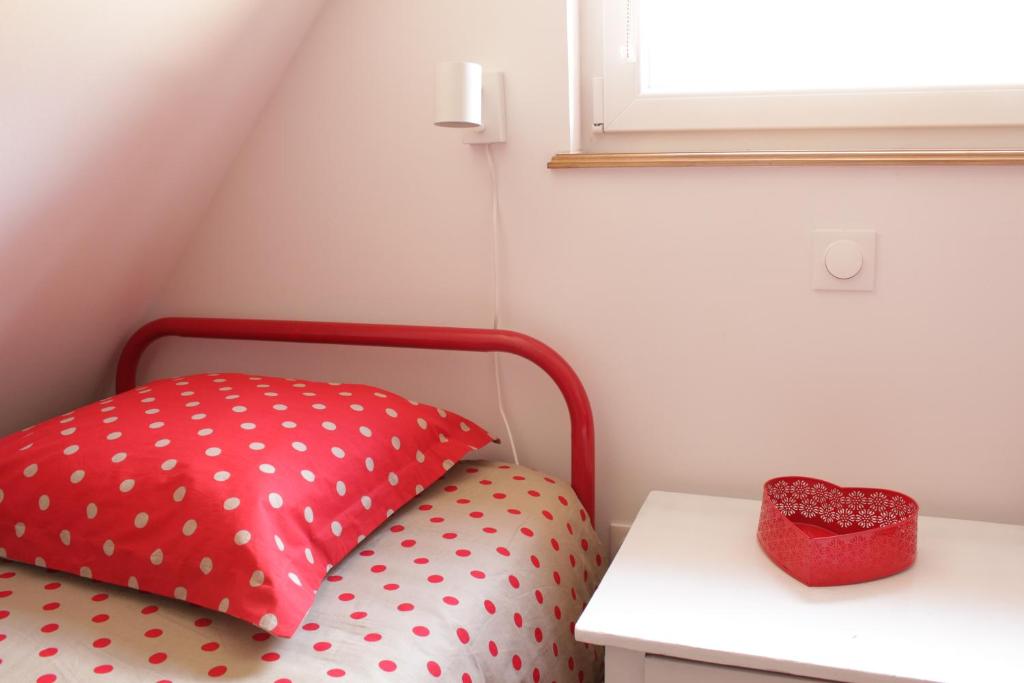 Una cama o camas en una habitaci&oacute;n de G&icirc;te de l&#39;Abbatiale, 3 &eacute;toiles, proche d&#39;Europa-Park, 1 &agrave; 6 personnes