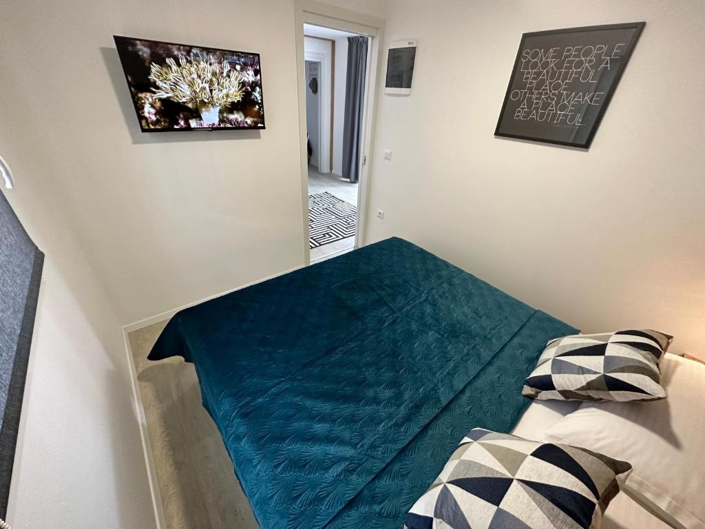 Postel nebo postele na pokoji v ubytování Mobile home Mare Blu