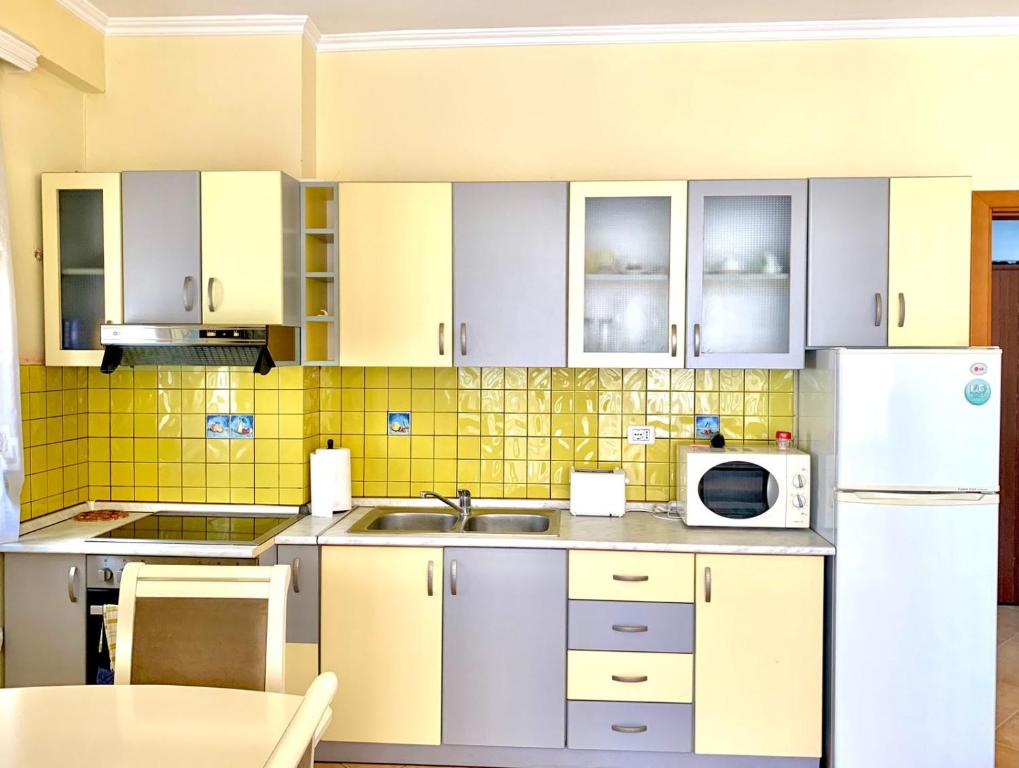 Four Seasons Beach Apartment - Imazhi 4