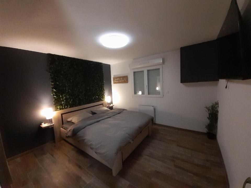 Postel nebo postele na pokoji v ubytování Lov’&Spa