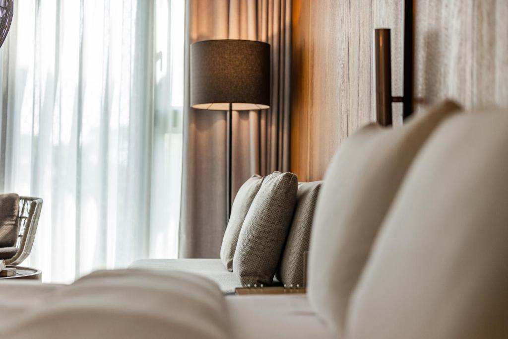 Postel nebo postele na pokoji v ubytování 了了礁溪 Vivir Jiaoxi Hotel