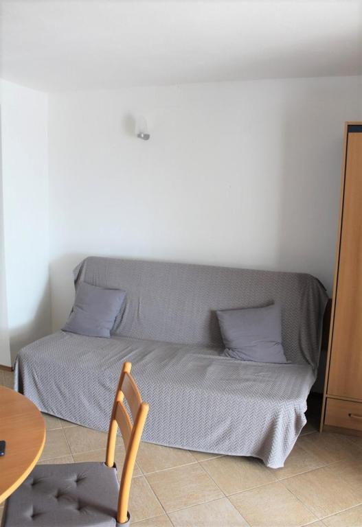 Postel nebo postele na pokoji v ubytování Apartments Ada