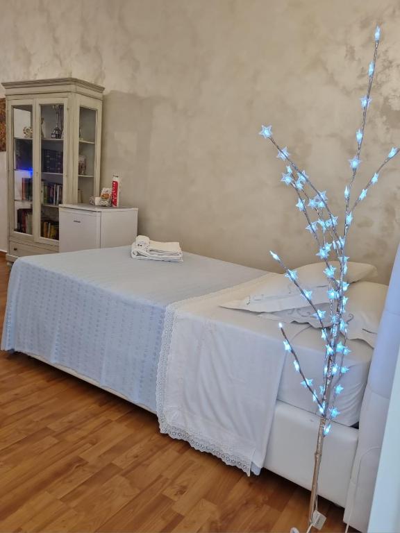 Postel nebo postele na pokoji v ubytování SUITE OF KLIMT