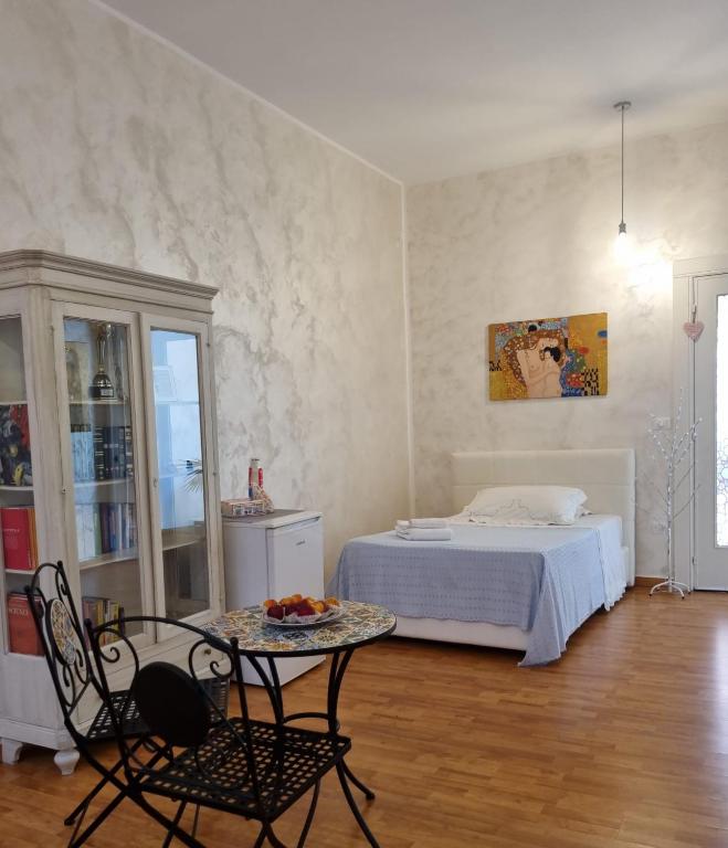 Postel nebo postele na pokoji v ubytování SUITE OF KLIMT