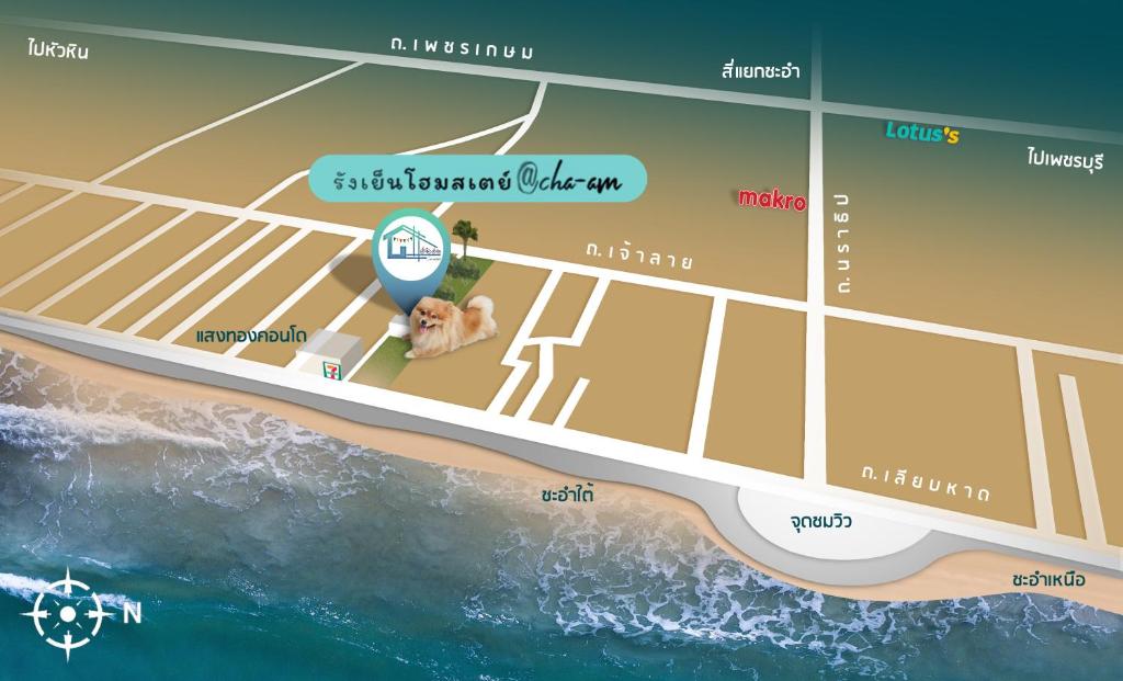 een kaart van het strand met een hond op het strand bij Rangyen Homestay Cha-Am รังเย็น in Cha Am
