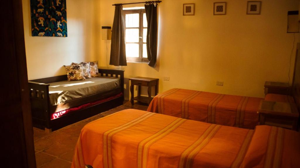 Postel nebo postele na pokoji v ubytování La Casona de Moldes