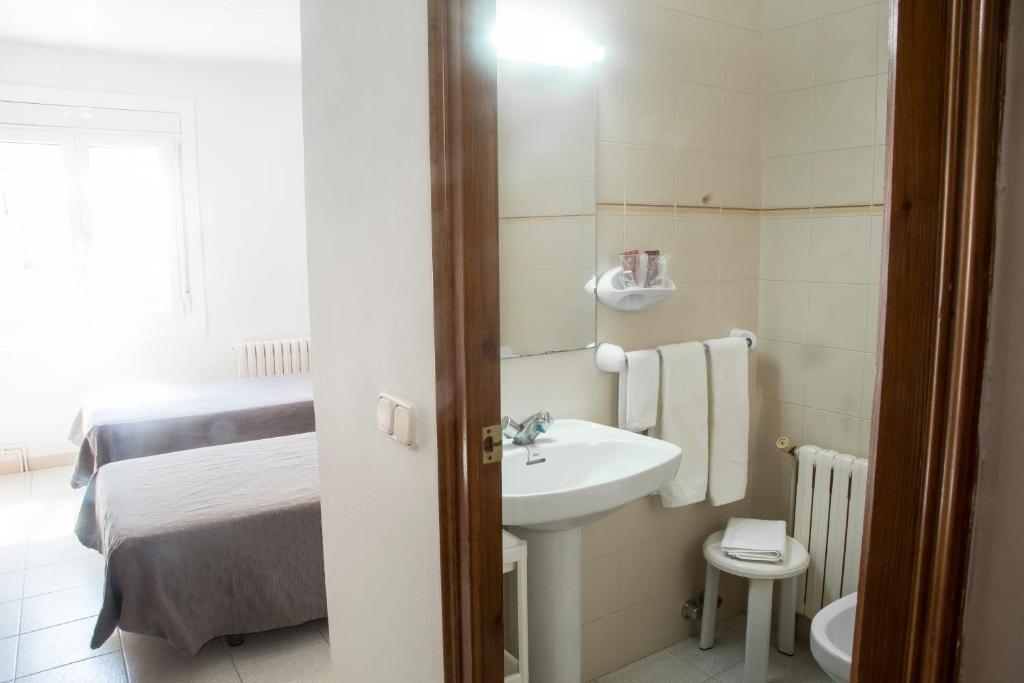 Postel nebo postele na pokoji v ubytování Turó de L´Home