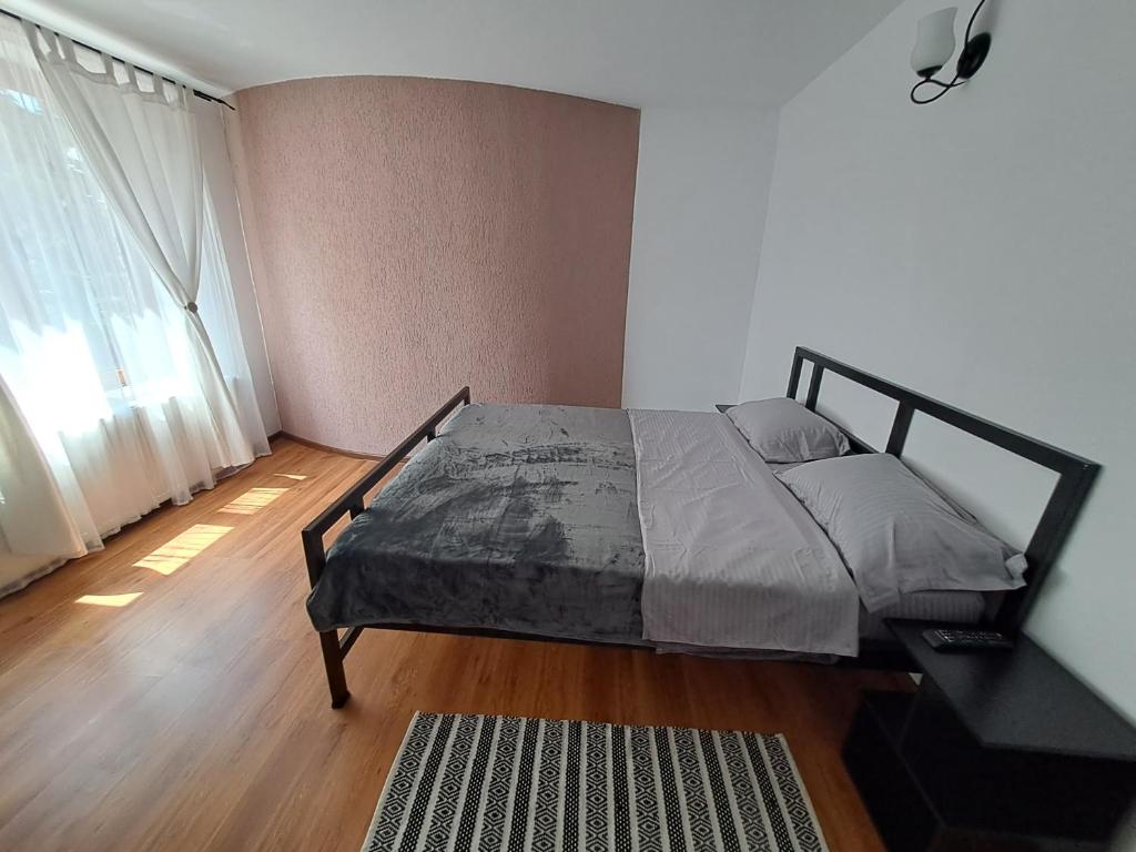 Postel nebo postele na pokoji v ubytování Pensiunea Theo Enelid