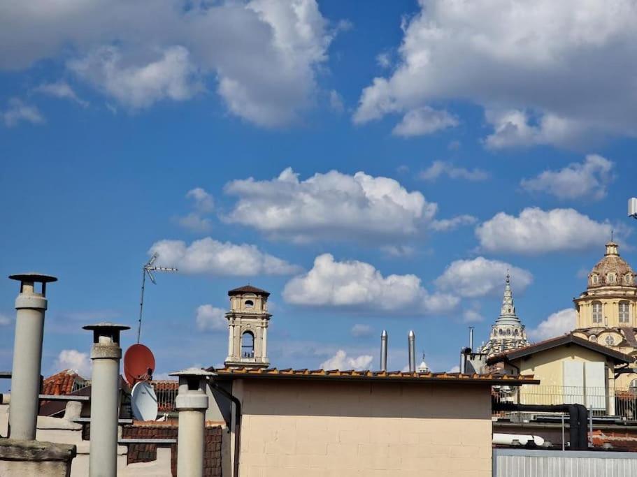 a view of the rooftops of a city at Fil-Rouge - Elegante e tranquilla vista in Centro in Turin