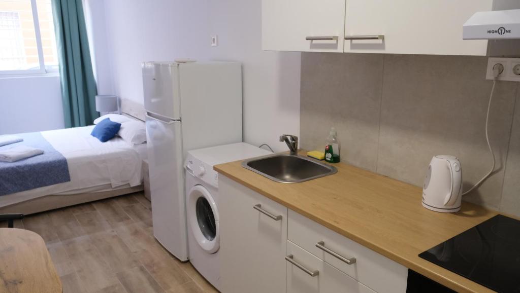 Kuchyňa alebo kuchynka v ubytovaní SDH apartments