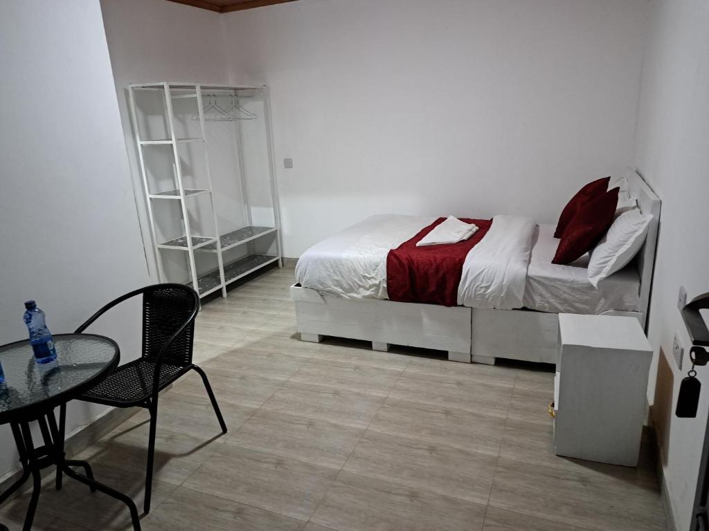 Postel nebo postele na pokoji v ubytování Jazby Guest House, Naivasha