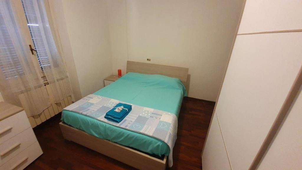 Postel nebo postele na pokoji v ubytování Vicolo Verri