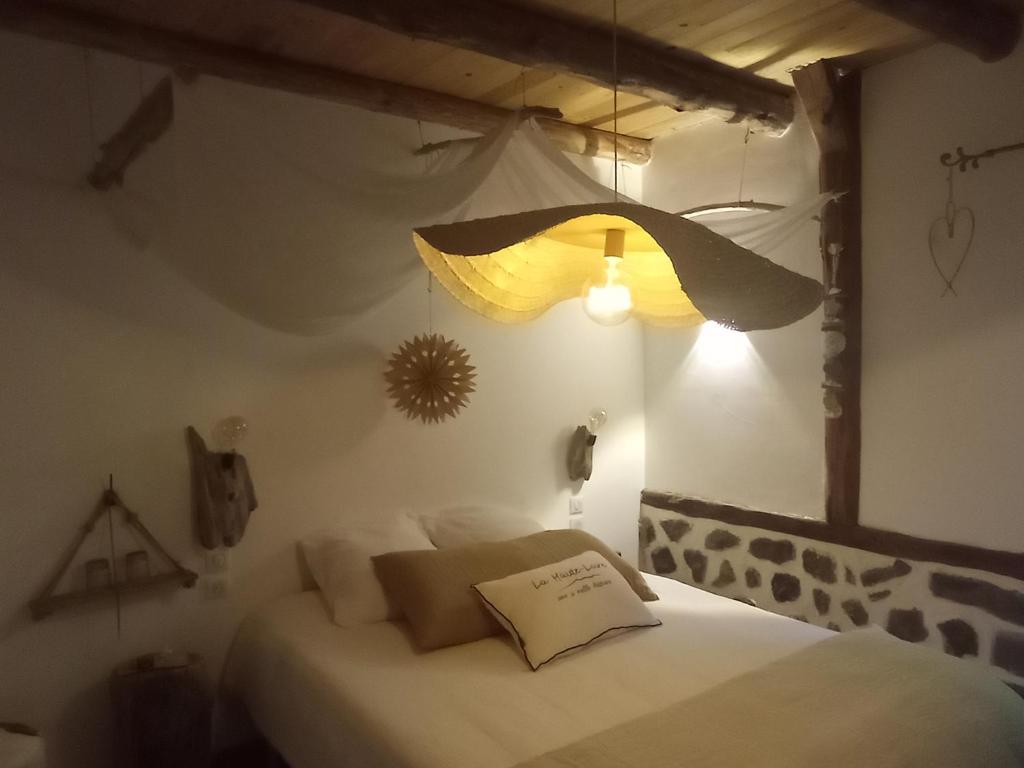 Tempat tidur dalam kamar di 21lemonde