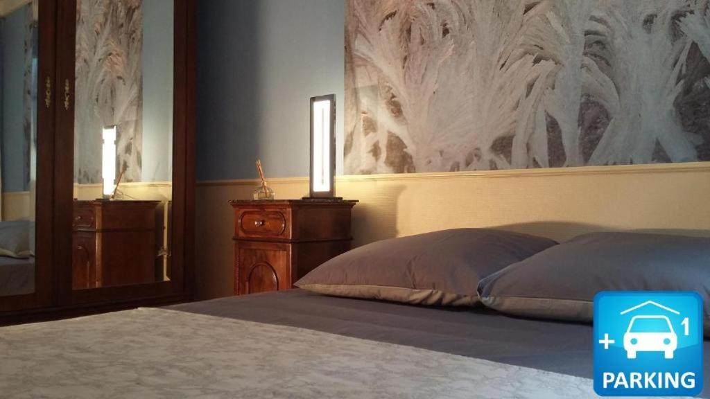 Postel nebo postele na pokoji v ubytování Commanderie Cottage Colmar