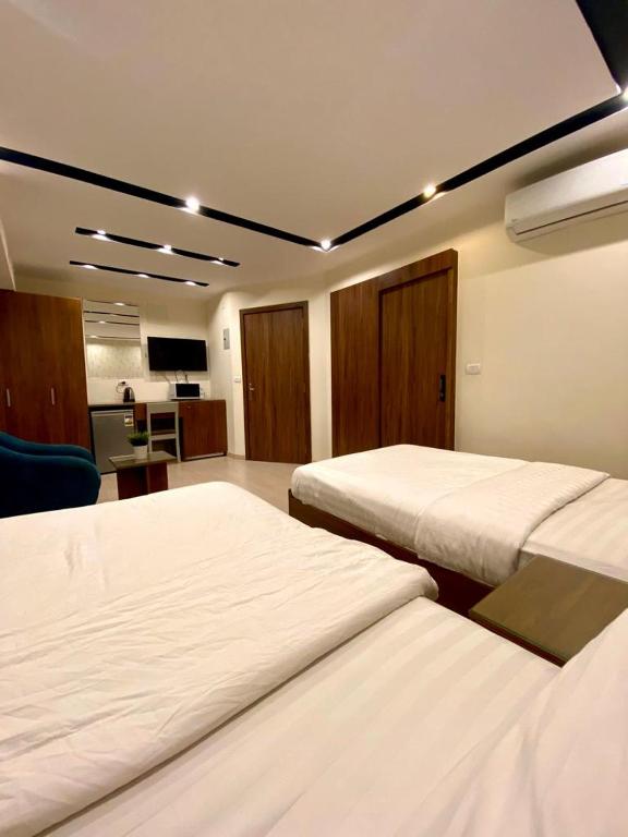A bed or beds in a room at Hostel 390