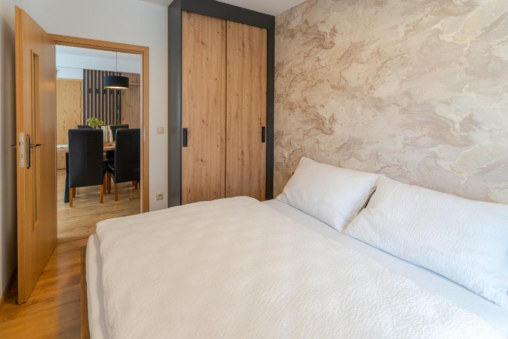 Postel nebo postele na pokoji v ubytování Apartmány Bobrík