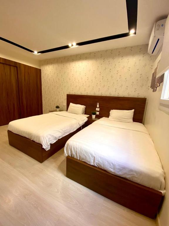 A bed or beds in a room at Hostel 390