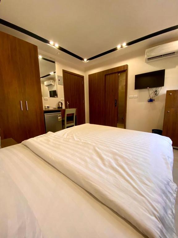 A bed or beds in a room at Hostel 390