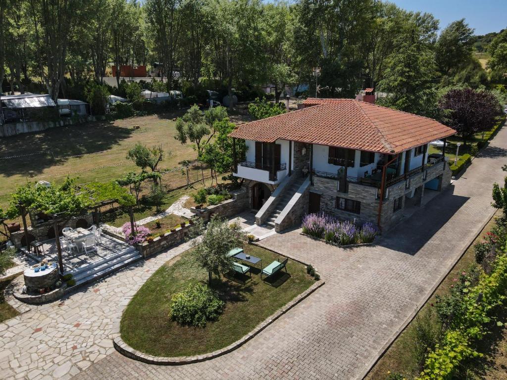 an aerial view of a house with a garden at Sotiria house apartment sea view lovely garden in Ierissos