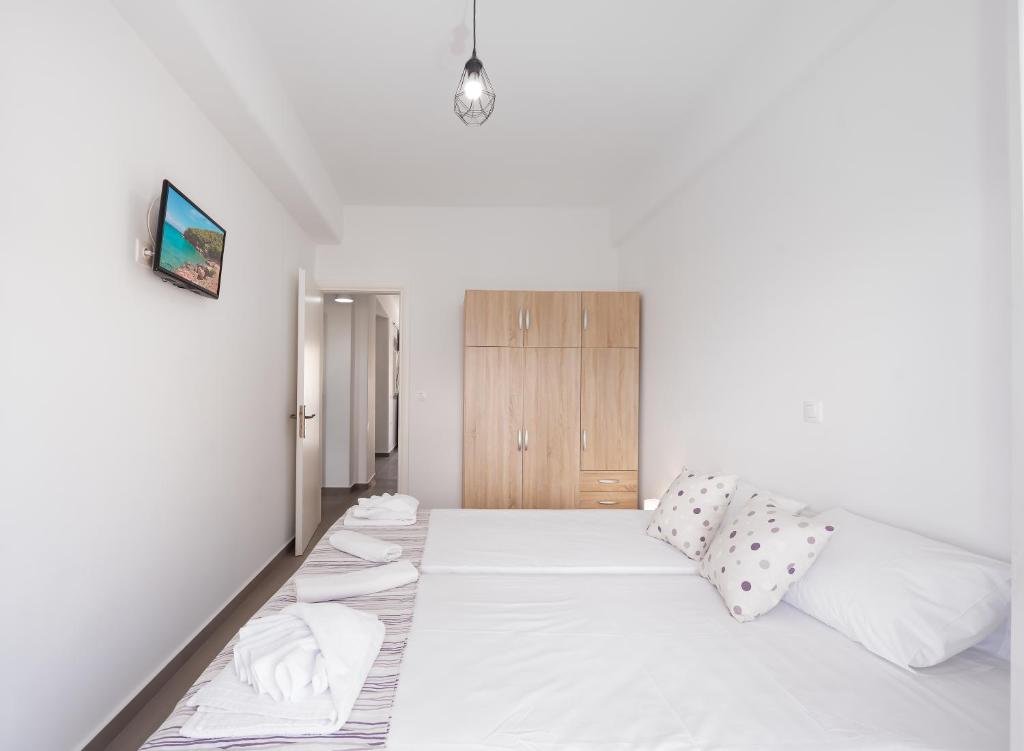Cama o camas de una habitación en Anzuelo Apartments