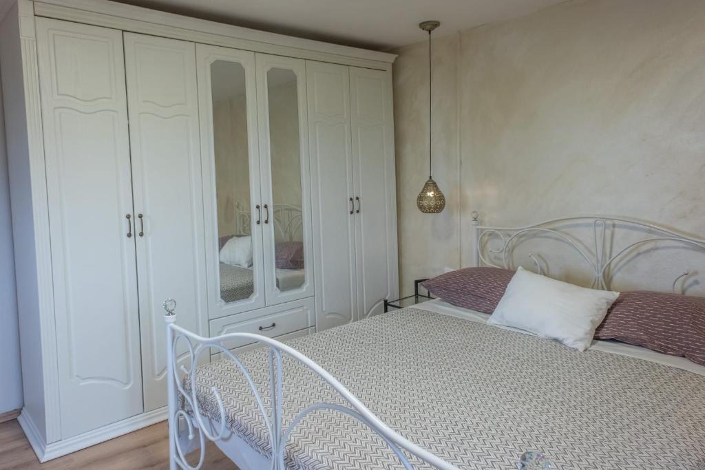 Postel nebo postele na pokoji v ubytování Casa Angelo
