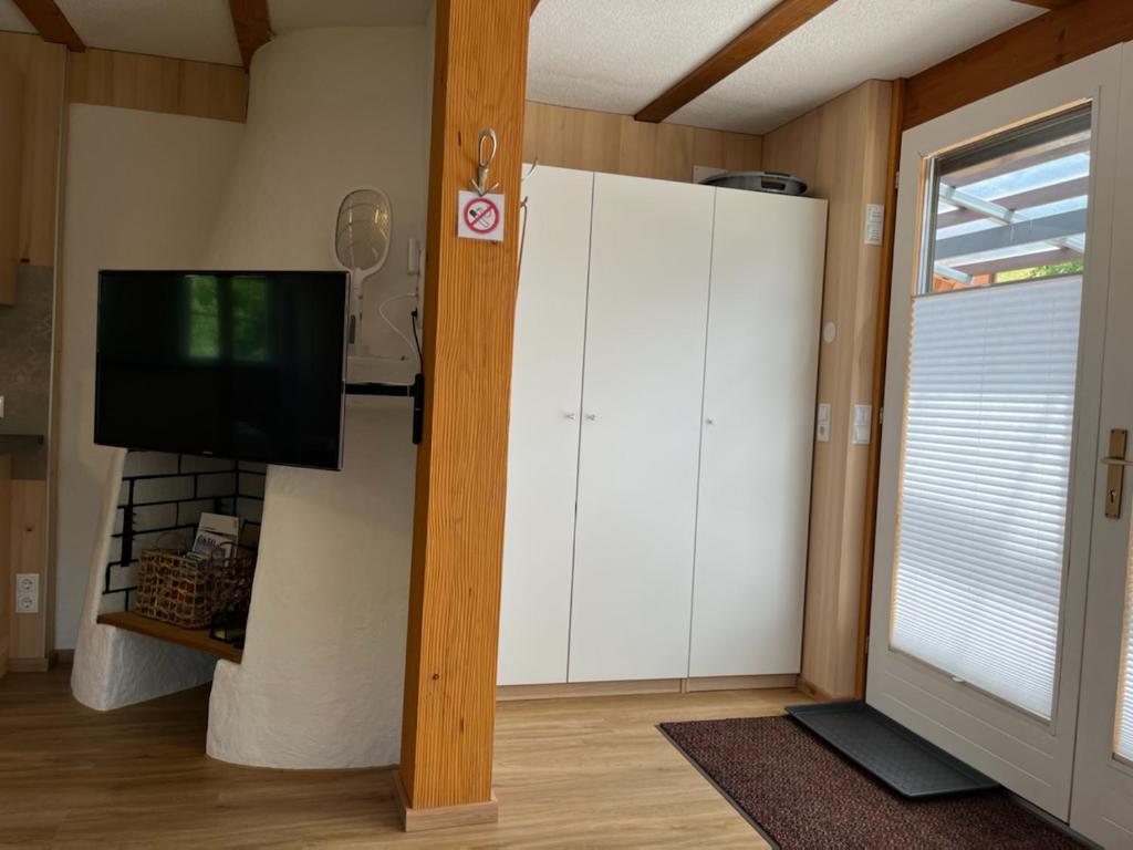 TV a/nebo společenská místnost v ubytování Tiny Haus Dornbirn