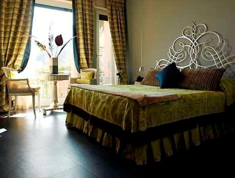 Cama ou camas em um quarto em Locanda A Cà Du Gigante