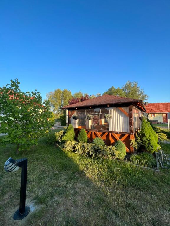 Vonkajšia záhrada v ubytovaní Domki i pokoje goscinne A A Malinowscy
