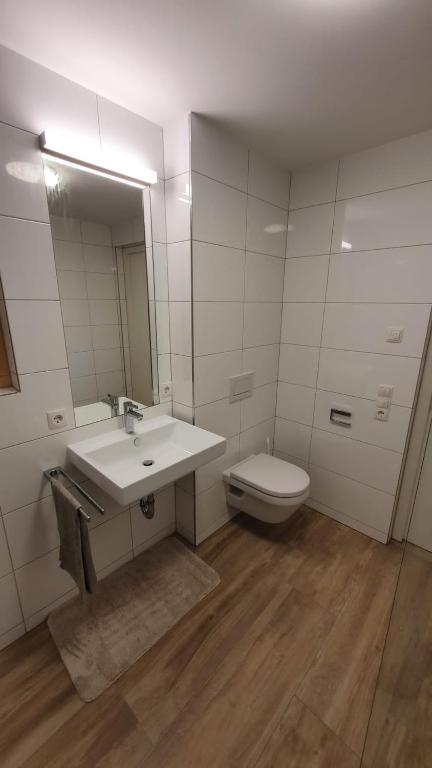 Koupelna v ubytování Apartments "Am Ardetzenberg"