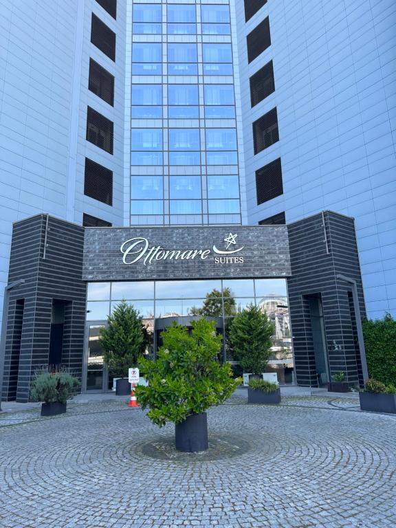 a building with a sign that reads entrance winds at Ottomare Suites sea, view, pool, gym in Istanbul