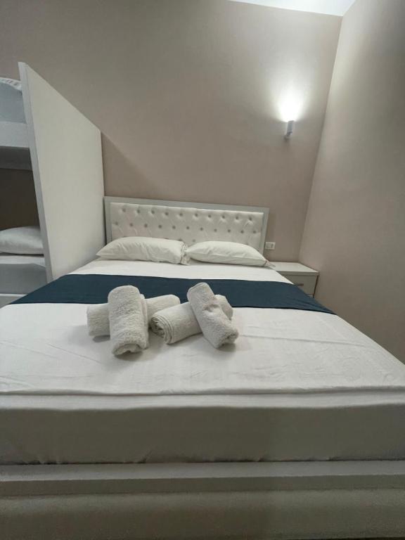 Postel nebo postele na pokoji v ubytování Vila Zini