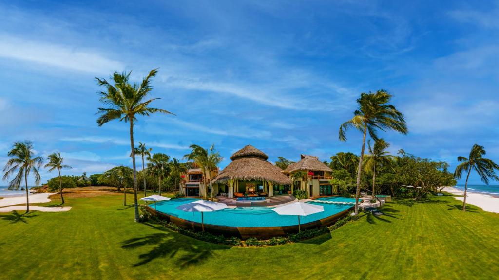 an image of a resort with a swimming pool at Akamá in Punta Mita