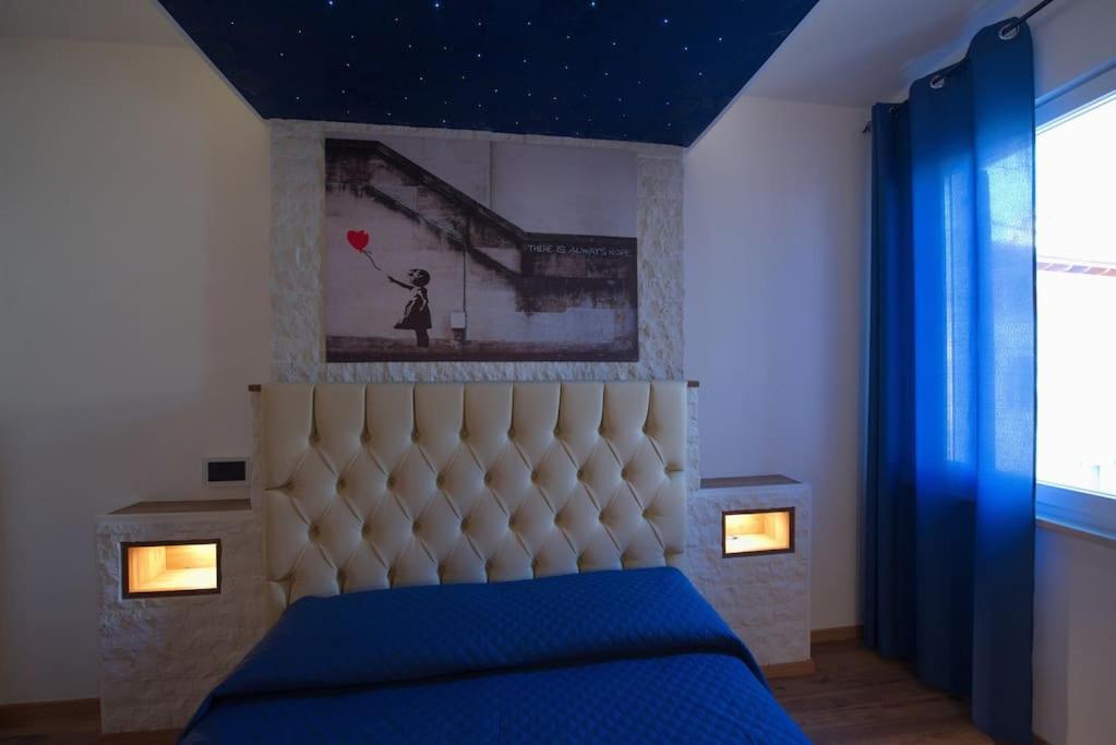 Postel nebo postele na pokoji v ubytování Vicolo Mincio Home