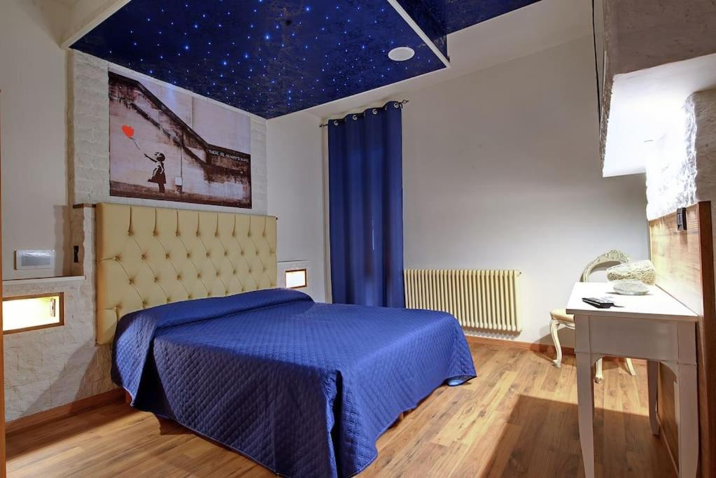 Postel nebo postele na pokoji v ubytování Vicolo Mincio Home