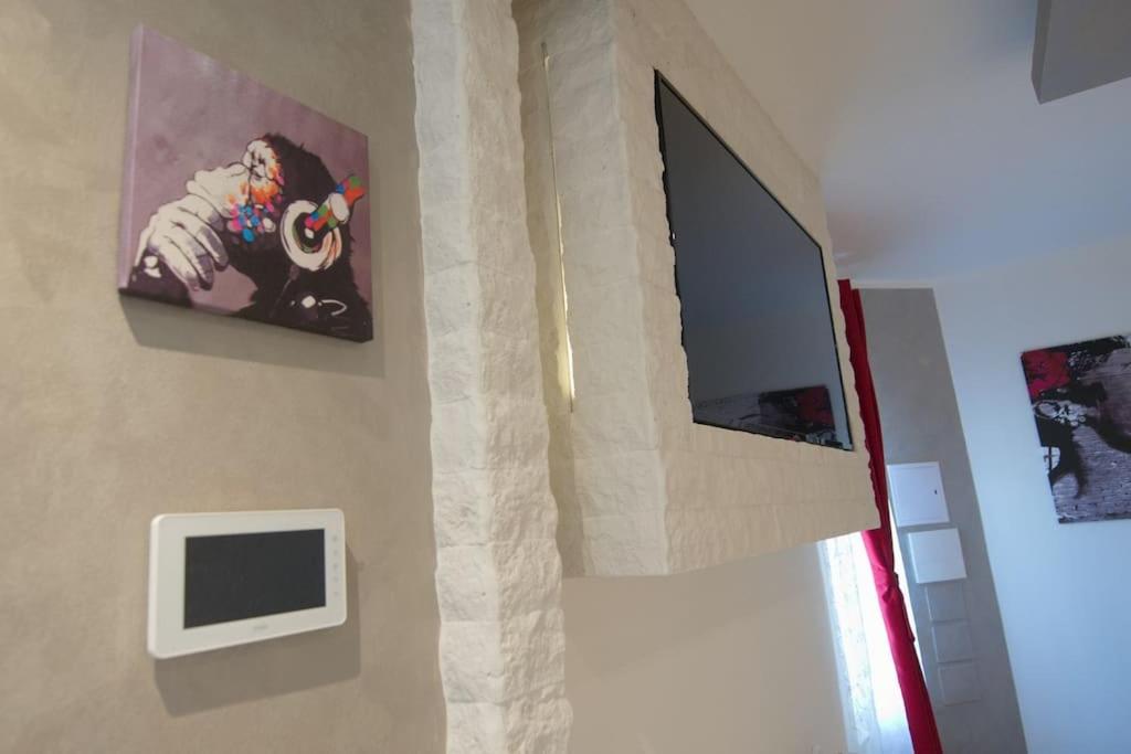 TV a/nebo společenská místnost v ubytování Vicolo Mincio Home
