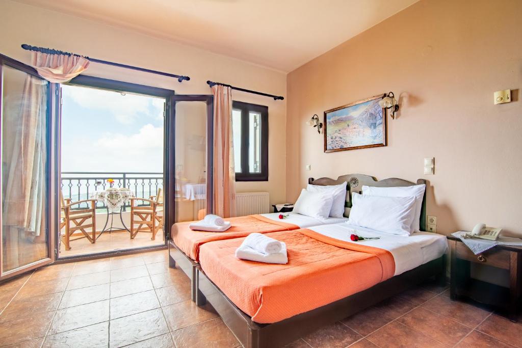 Postel nebo postele na pokoji v ubytování Hotel Marina