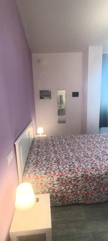 Postel nebo postele na pokoji v ubytování Affittacamere Villa Zelinda