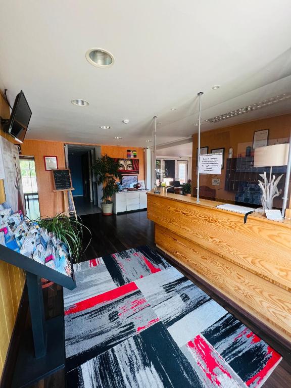Kuchyň nebo kuchyňský kout v ubytování Hôtel Le Forestia