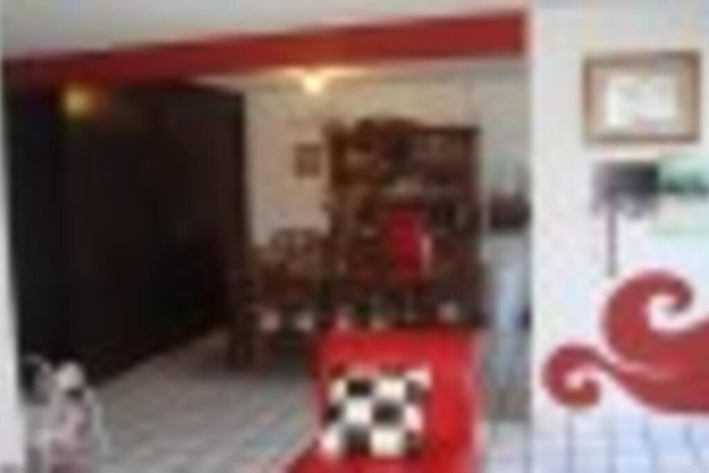 a store front with a cow toy in a room at Departamento Rouge in Cuernavaca