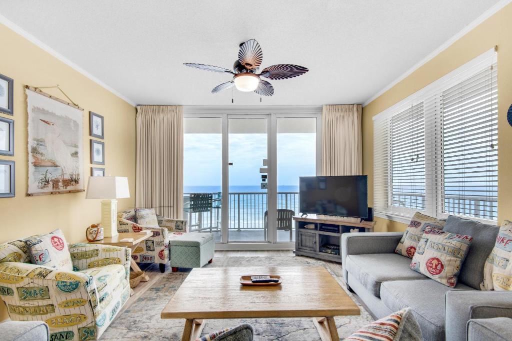 a living room with a view of the ocean at Summerwind Center 704 in Navarre