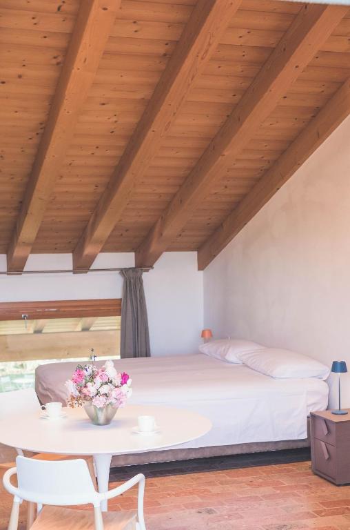 Postel nebo postele na pokoji v ubytování Agriturismo Casa Fiorindo