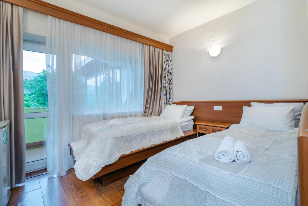 Postel nebo postele na pokoji v ubytování EcoRest - Likani Palace