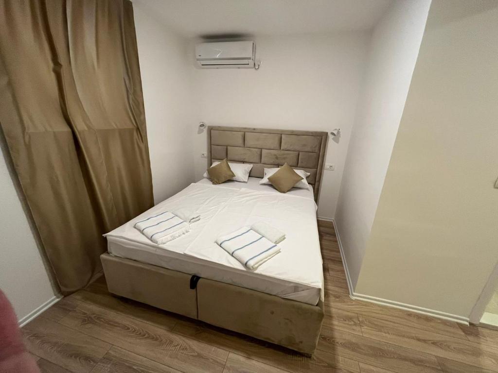 Postel nebo postele na pokoji v ubytování Apartments Ejla&Una