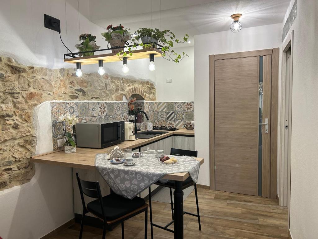 Kuchnia lub aneks kuchenny w obiekcie Tesori di Sardegna